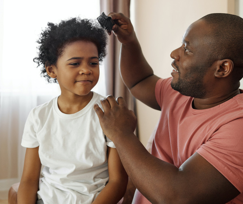 father-brushing-his-son-s-hair-4260099.jpg
